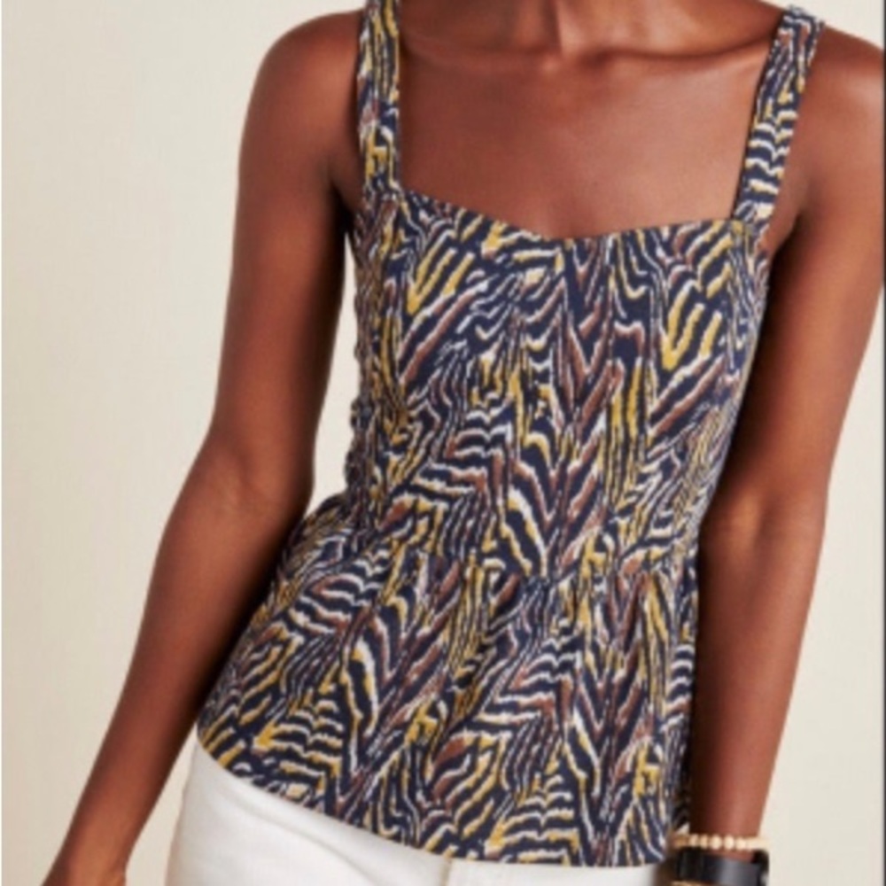 Anthropologie animal print peplum tank. L